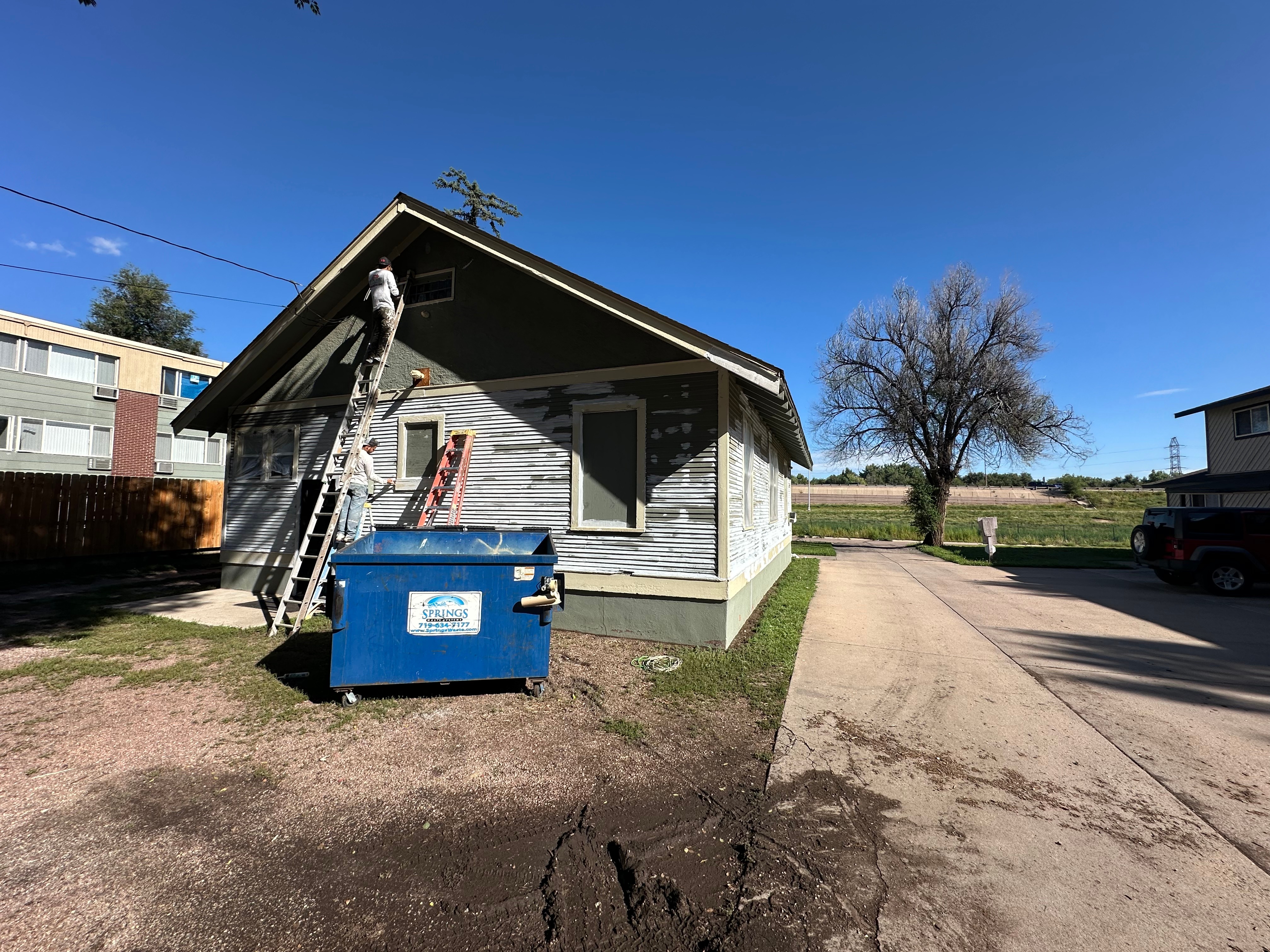 Team Working on Exterior - Professional Service