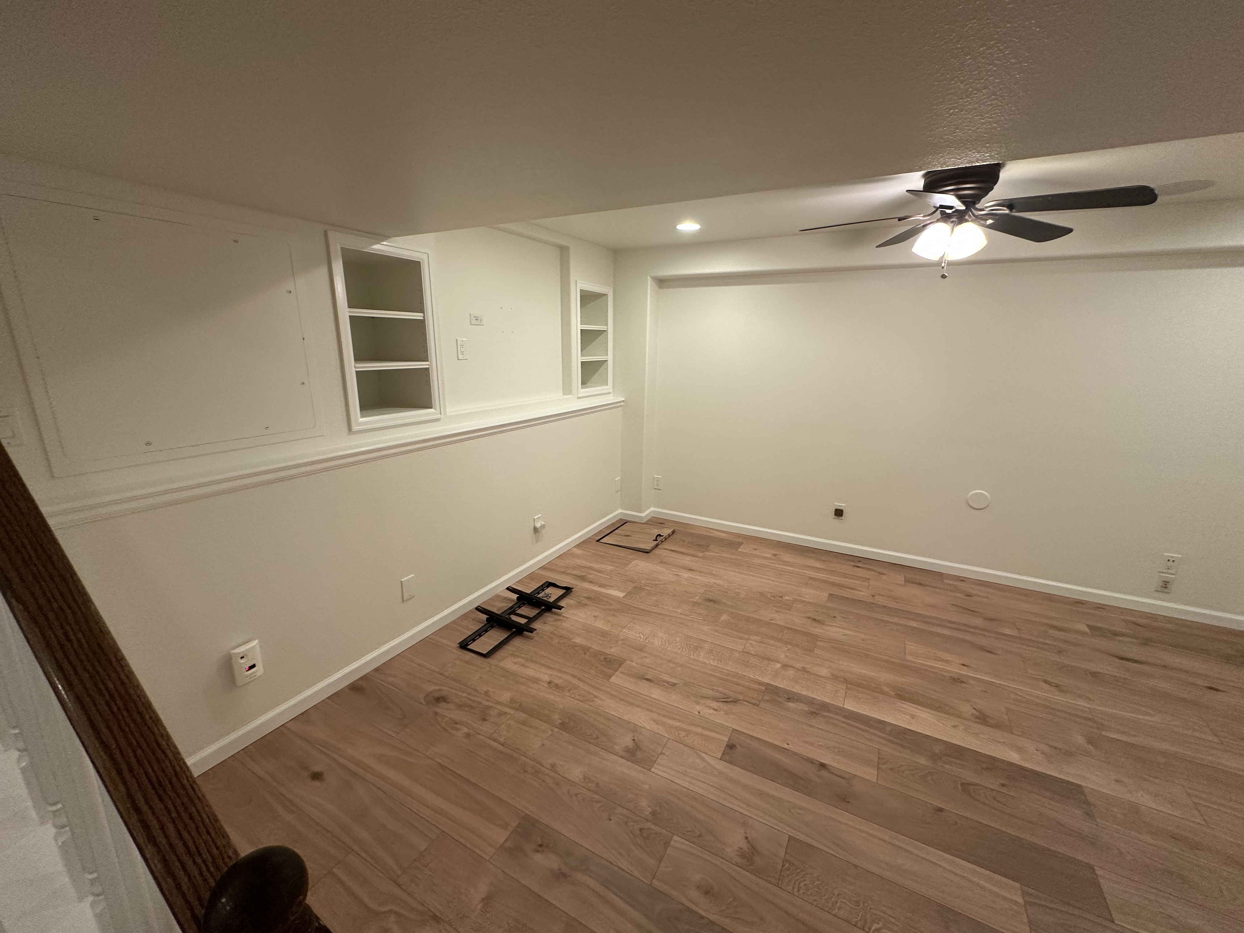 Finished Basement with Built-in Shelving - Custom Work